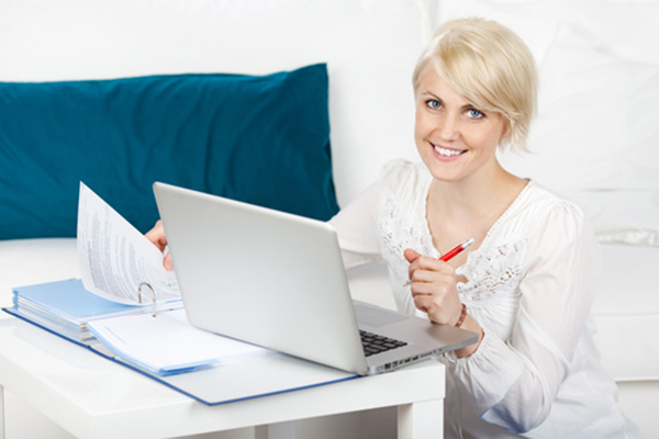 A factoring broker working from a home office